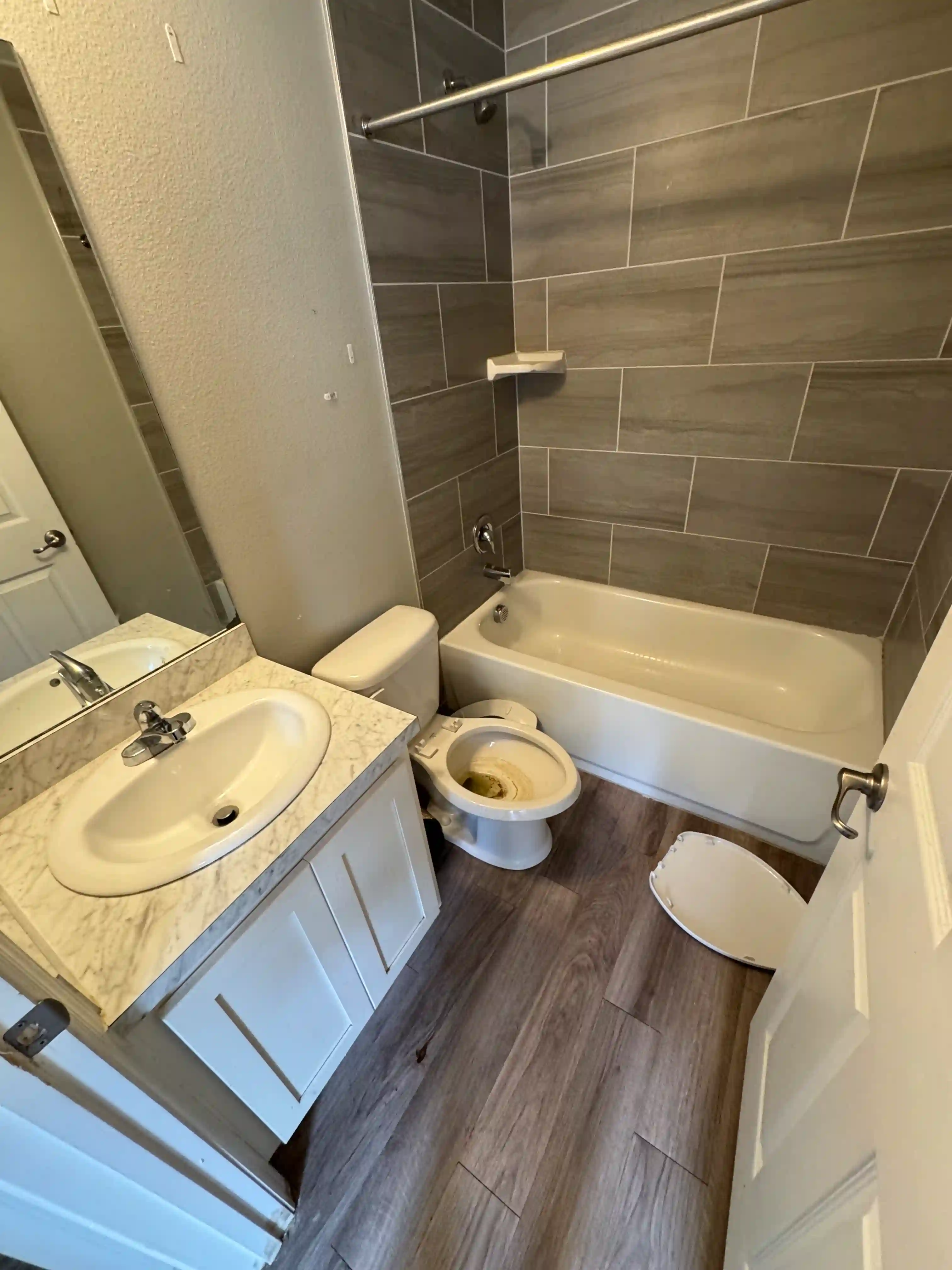 Bathroom vanity mirror closet reflection vacant unit