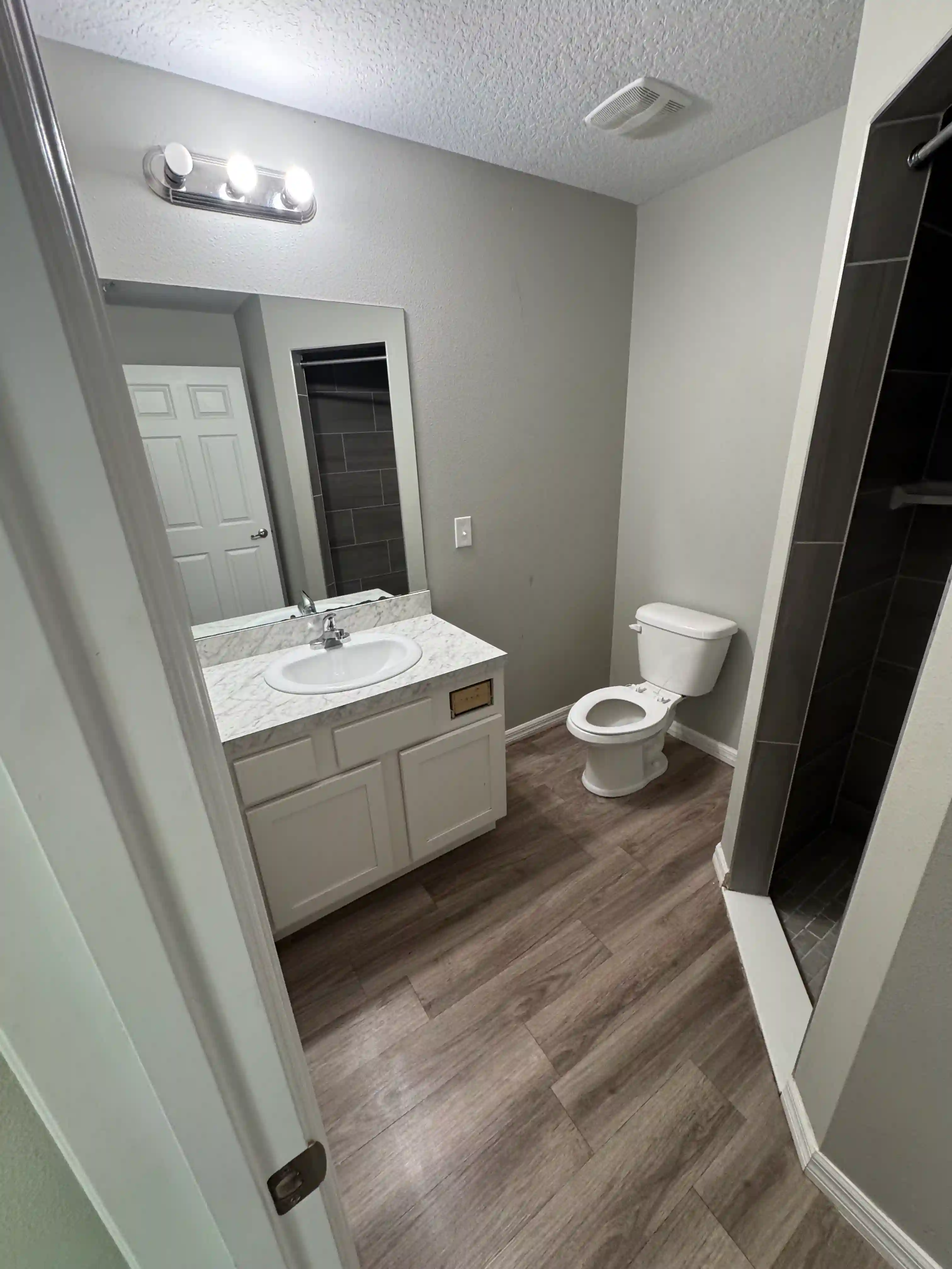 Bathroom vanity tub shower vacant unit