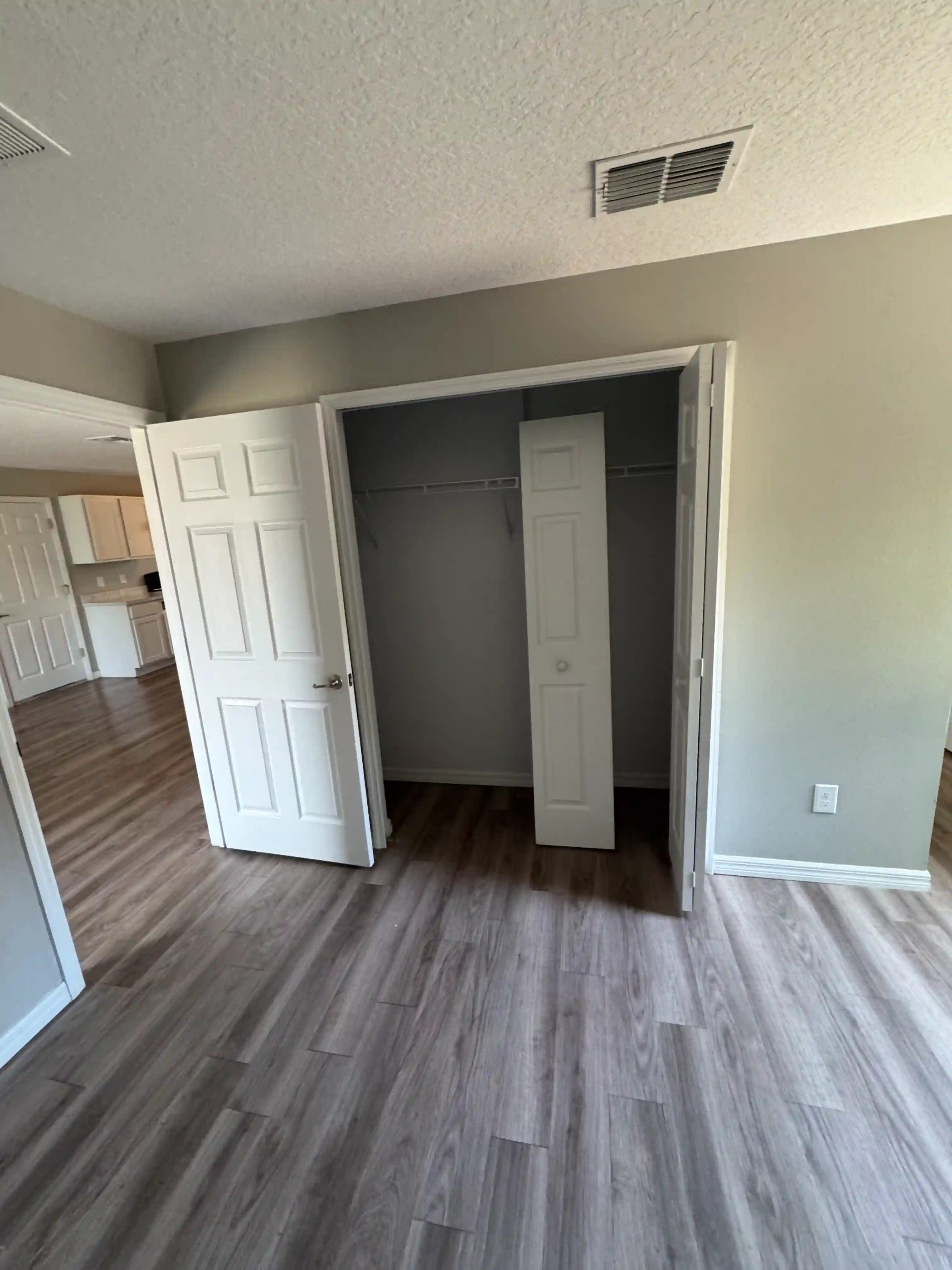 Bedroom closet double doors vacant unit