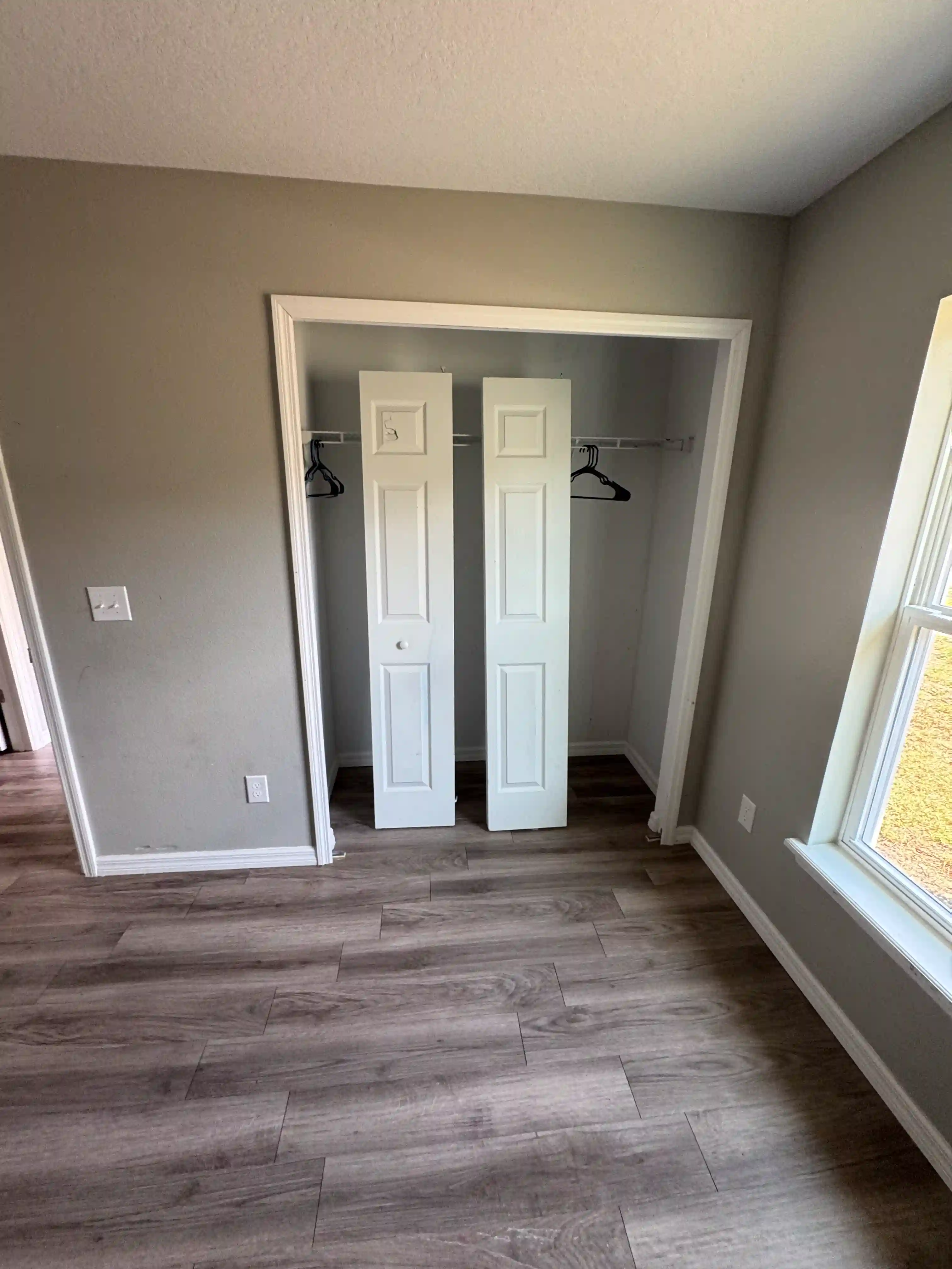 Bedroom closet double doors vacant unit
