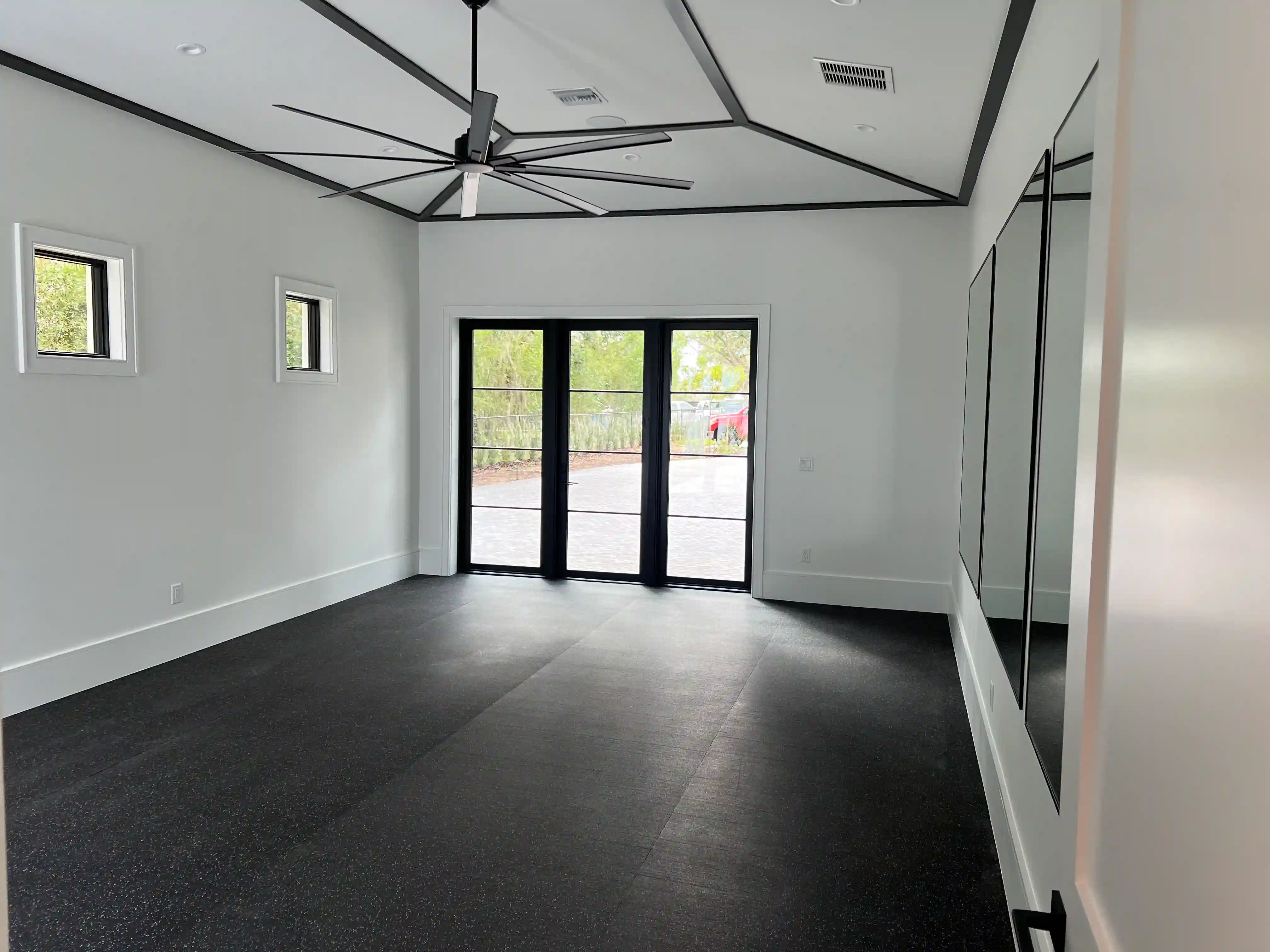 Bonus room home gym mirrors unfurnished