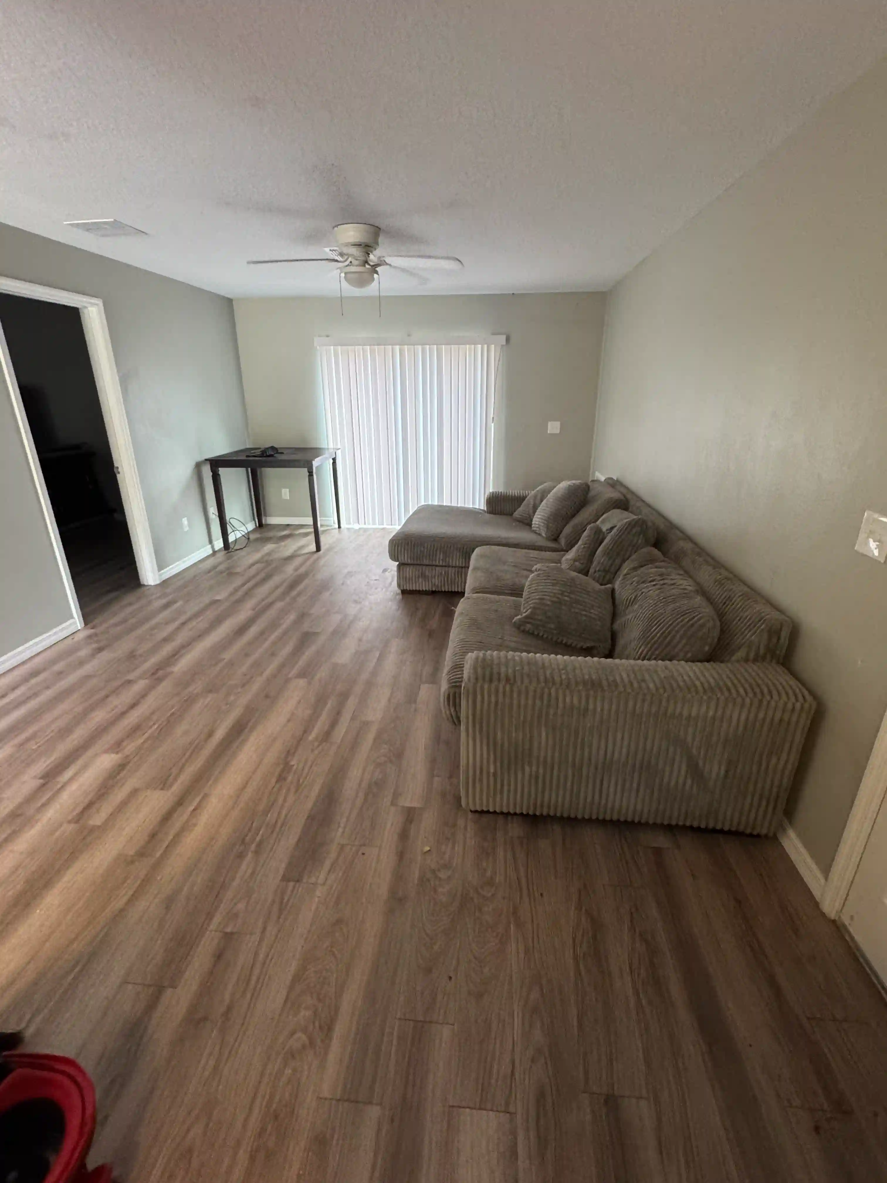 Living room empty sectional sofa vacant unit
