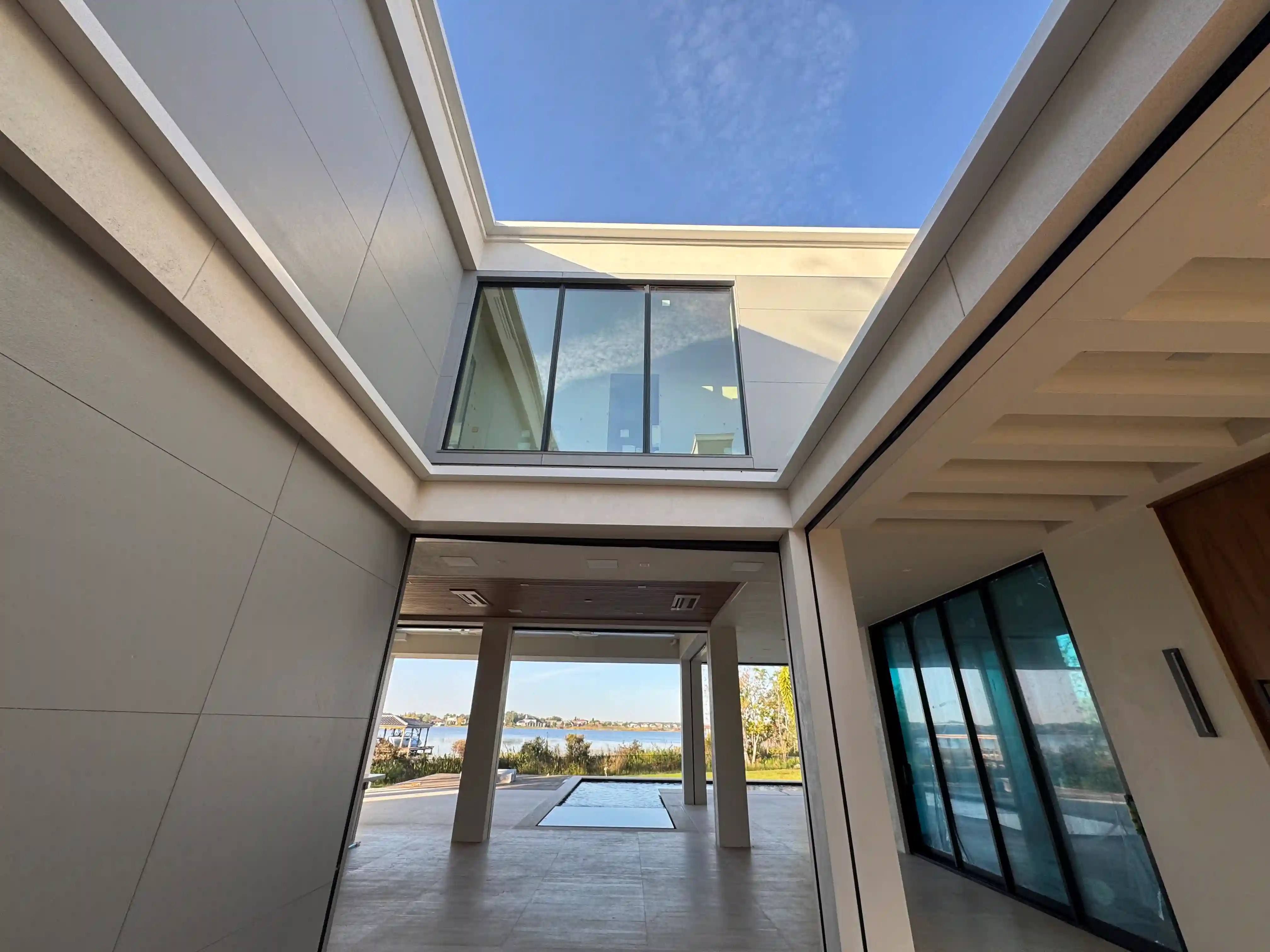 Modern home courtyard reflecting pool lake
