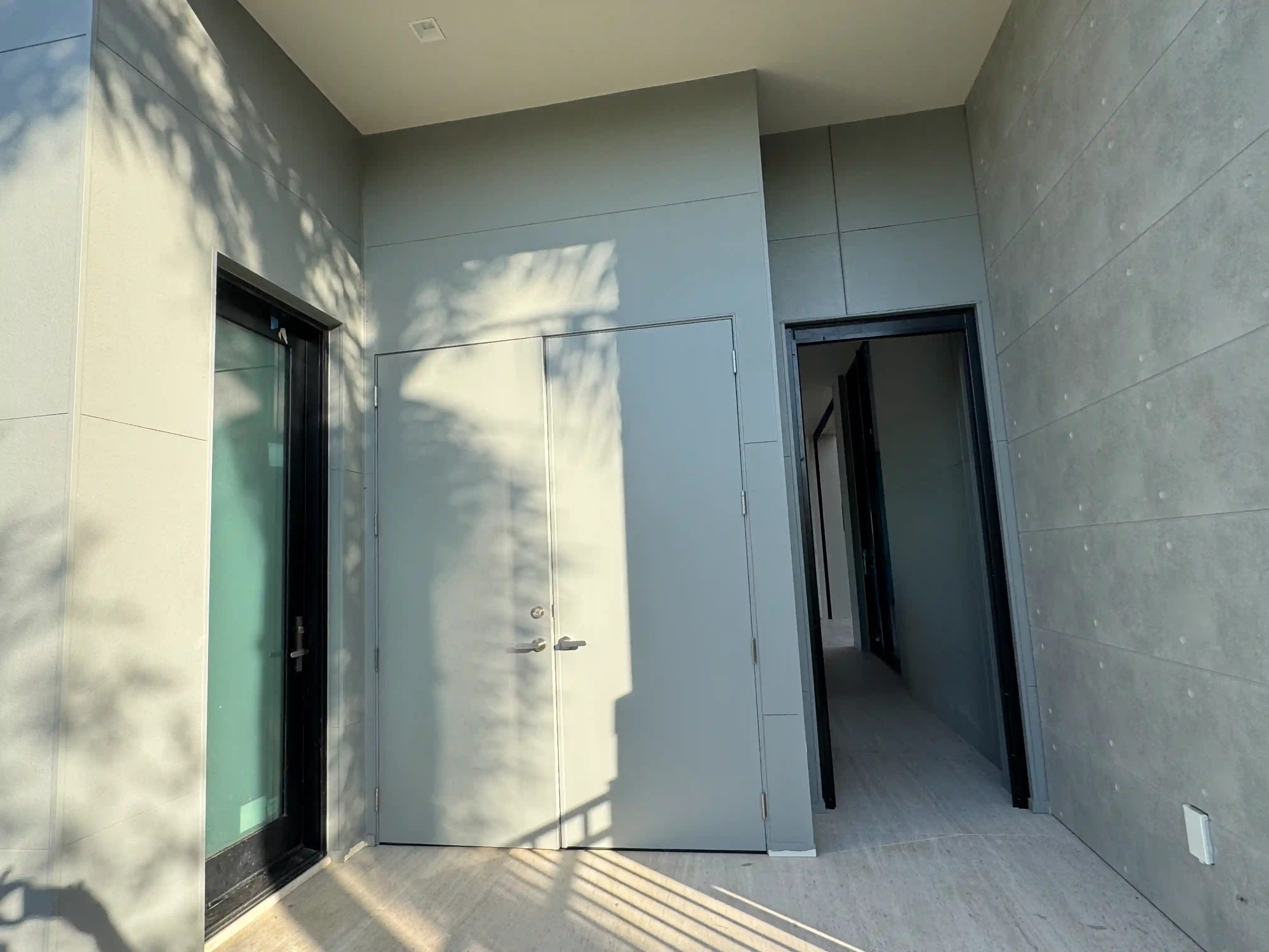 Modern home exterior courtyard doors