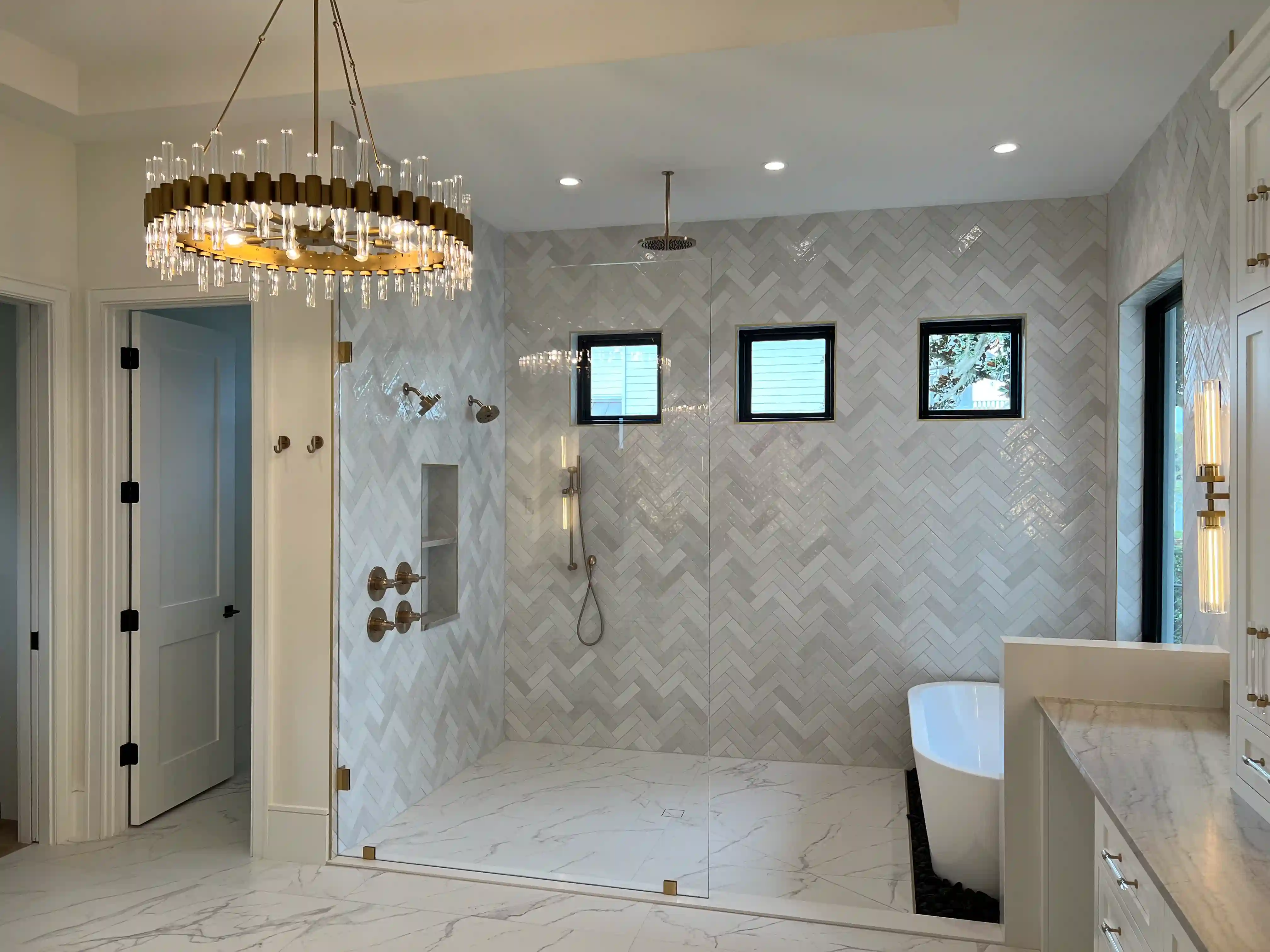 Primary bath herringbone shower finished